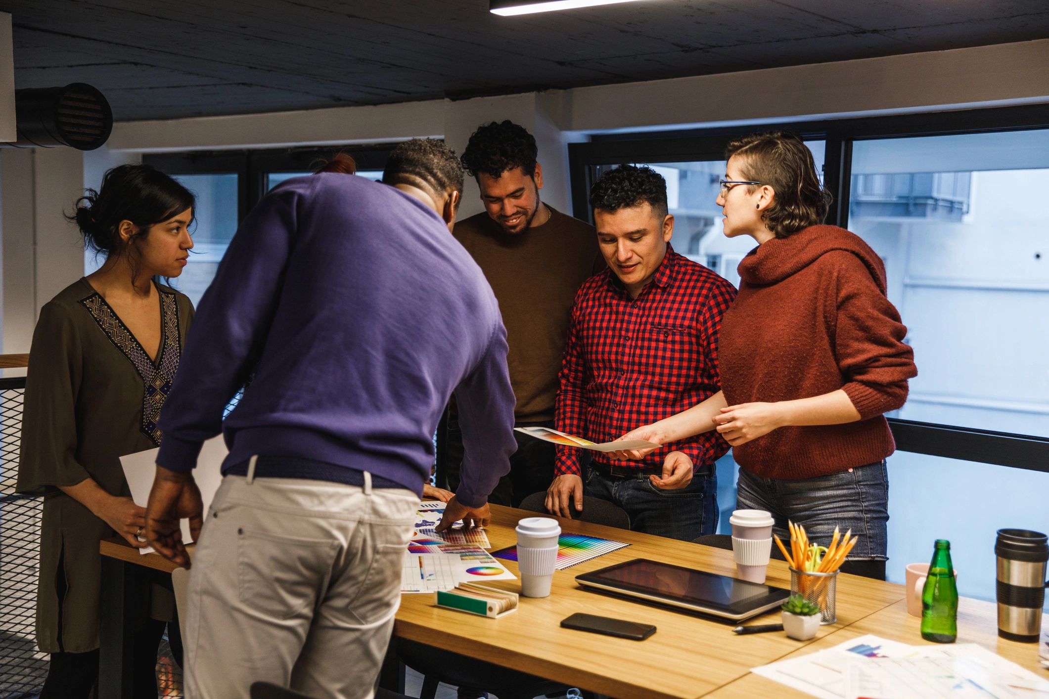 Team collaborating on brand strategy in an office